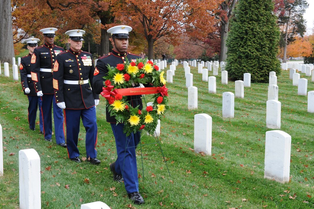 Sgt. Maj. Micheal P. Barrett, the 17th Sergeant Major of the Marine Corps, participates in a wreath laying ceremony in honor of Sgt. Maj. Francis D. Rauber, the 2nd Sergeant Major of the Marine Corps, at his gravesite in Arlington National Cemetary, Nov. 10, 2011.